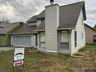 Welcome home to this thoughtfully updated tri-level townhouse on Riverton Country Club in Wyoming - for sale on GolfHomes.com, golf home, golf lot