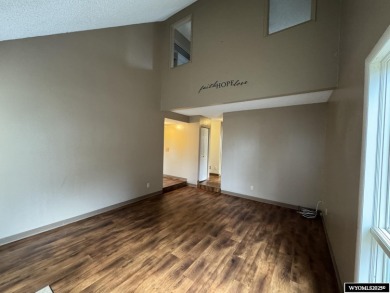 Welcome home to this thoughtfully updated tri-level townhouse on Riverton Country Club in Wyoming - for sale on GolfHomes.com, golf home, golf lot