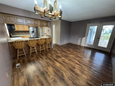 Welcome home to this thoughtfully updated tri-level townhouse on Riverton Country Club in Wyoming - for sale on GolfHomes.com, golf home, golf lot