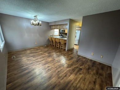 Welcome home to this thoughtfully updated tri-level townhouse on Riverton Country Club in Wyoming - for sale on GolfHomes.com, golf home, golf lot