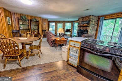 Tucked in Sky Valley's golf community, this tiny treehouse on Sky Valley Resort and Country Club in Georgia - for sale on GolfHomes.com, golf home, golf lot