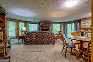 Tucked in Sky Valley's golf community, this tiny treehouse on Sky Valley Resort and Country Club in Georgia - for sale on GolfHomes.com, golf home, golf lot
