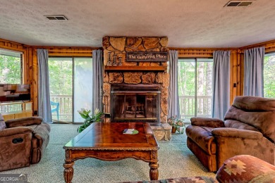 Tucked in Sky Valley's golf community, this tiny treehouse on Sky Valley Resort and Country Club in Georgia - for sale on GolfHomes.com, golf home, golf lot