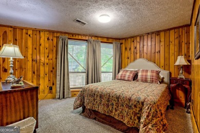 Tucked in Sky Valley's golf community, this tiny treehouse on Sky Valley Resort and Country Club in Georgia - for sale on GolfHomes.com, golf home, golf lot