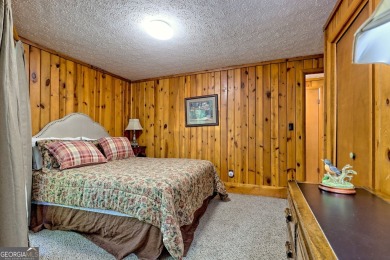 Tucked in Sky Valley's golf community, this tiny treehouse on Sky Valley Resort and Country Club in Georgia - for sale on GolfHomes.com, golf home, golf lot