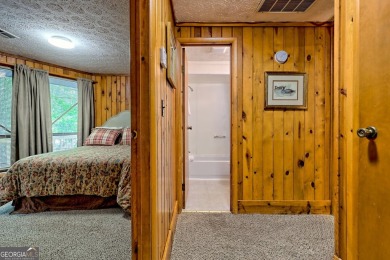 Tucked in Sky Valley's golf community, this tiny treehouse on Sky Valley Resort and Country Club in Georgia - for sale on GolfHomes.com, golf home, golf lot