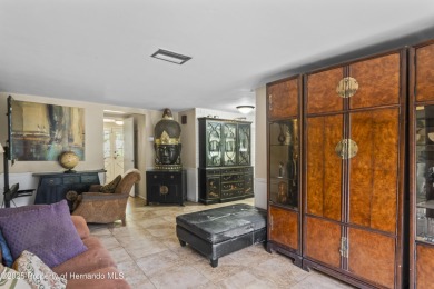 Welcome to this beautifully landscaped corner lot home located on Beacon Woods Golf Club in Florida - for sale on GolfHomes.com, golf home, golf lot