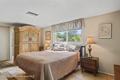 Welcome to this beautifully landscaped corner lot home located on Beacon Woods Golf Club in Florida - for sale on GolfHomes.com, golf home, golf lot