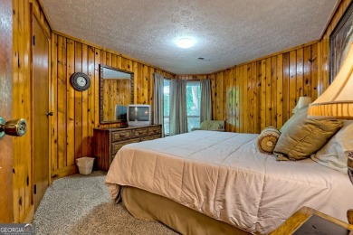 Tucked in Sky Valley's golf community, this tiny treehouse on Sky Valley Resort and Country Club in Georgia - for sale on GolfHomes.com, golf home, golf lot