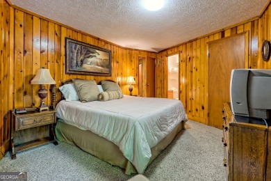 Tucked in Sky Valley's golf community, this tiny treehouse on Sky Valley Resort and Country Club in Georgia - for sale on GolfHomes.com, golf home, golf lot