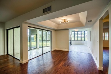 Resort-style and maintenance-free living can be yours in this on Jonathans Landing Golf Club in Florida - for sale on GolfHomes.com, golf home, golf lot