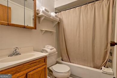 Tucked in Sky Valley's golf community, this tiny treehouse on Sky Valley Resort and Country Club in Georgia - for sale on GolfHomes.com, golf home, golf lot