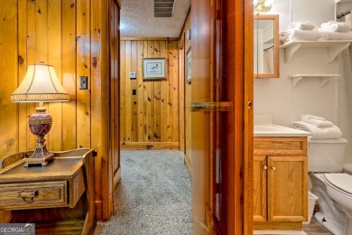 Tucked in Sky Valley's golf community, this tiny treehouse on Sky Valley Resort and Country Club in Georgia - for sale on GolfHomes.com, golf home, golf lot