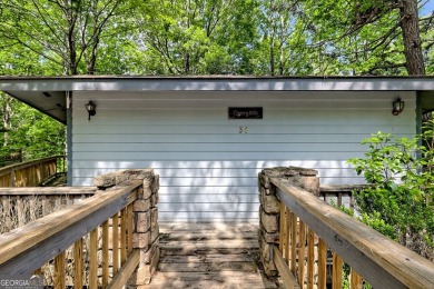 Tucked in Sky Valley's golf community, this tiny treehouse on Sky Valley Resort and Country Club in Georgia - for sale on GolfHomes.com, golf home, golf lot