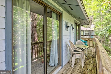 Tucked in Sky Valley's golf community, this tiny treehouse on Sky Valley Resort and Country Club in Georgia - for sale on GolfHomes.com, golf home, golf lot