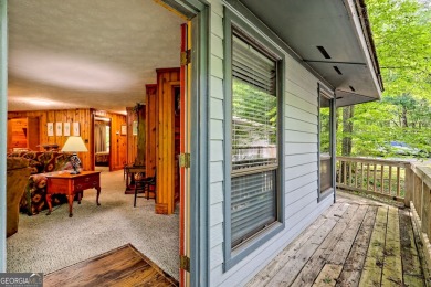 Tucked in Sky Valley's golf community, this tiny treehouse on Sky Valley Resort and Country Club in Georgia - for sale on GolfHomes.com, golf home, golf lot