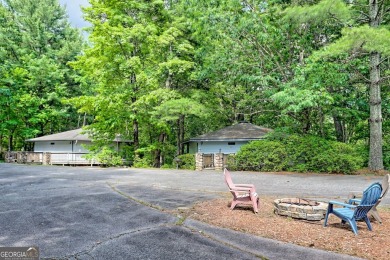 Tucked in Sky Valley's golf community, this tiny treehouse on Sky Valley Resort and Country Club in Georgia - for sale on GolfHomes.com, golf home, golf lot