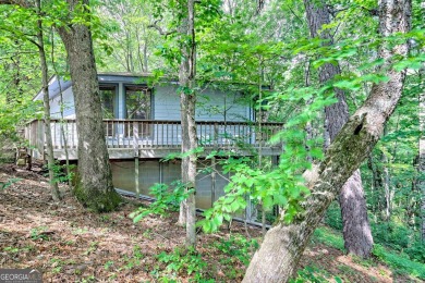 Tucked in Sky Valley's golf community, this tiny treehouse on Sky Valley Resort and Country Club in Georgia - for sale on GolfHomes.com, golf home, golf lot