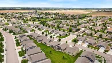 Low-maintenance living near the Poudre River Trail! Set in the on Boomerang Links in Colorado - for sale on GolfHomes.com, golf home, golf lot