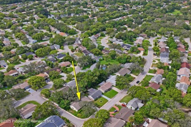 Welcome to this beautifully landscaped corner lot home located on Beacon Woods Golf Club in Florida - for sale on GolfHomes.com, golf home, golf lot