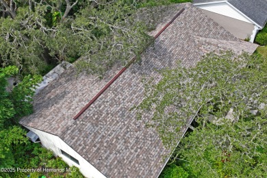 Welcome to this beautifully landscaped corner lot home located on Beacon Woods Golf Club in Florida - for sale on GolfHomes.com, golf home, golf lot