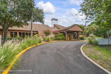 Welcome to this beautifully landscaped corner lot home located on Beacon Woods Golf Club in Florida - for sale on GolfHomes.com, golf home, golf lot