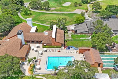 Welcome to this beautifully landscaped corner lot home located on Beacon Woods Golf Club in Florida - for sale on GolfHomes.com, golf home, golf lot