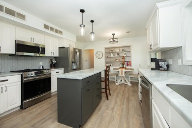 Step inside this move in ready ranch in Waverly where every on  in Iowa - for sale on GolfHomes.com, golf home, golf lot