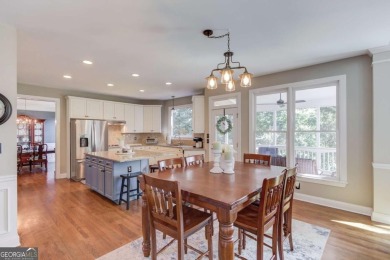 Welcome to this stunning 6 bedroom, 4 bath lakefront home in on Hamilton Mill Golf Club in Georgia - for sale on GolfHomes.com, golf home, golf lot