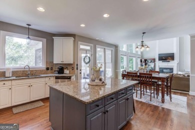 Welcome to this stunning 6 bedroom, 4 bath lakefront home in on Hamilton Mill Golf Club in Georgia - for sale on GolfHomes.com, golf home, golf lot