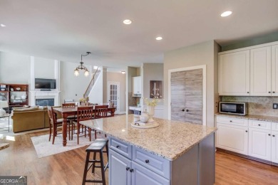 Welcome to this stunning 6 bedroom, 4 bath lakefront home in on Hamilton Mill Golf Club in Georgia - for sale on GolfHomes.com, golf home, golf lot