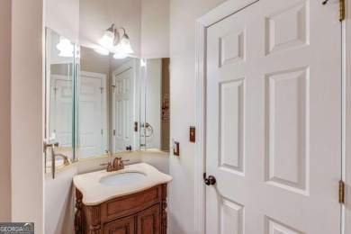 Welcome to this stunning 6 bedroom, 4 bath lakefront home in on Hamilton Mill Golf Club in Georgia - for sale on GolfHomes.com, golf home, golf lot