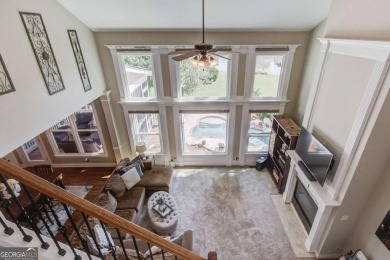 Welcome to this stunning 6 bedroom, 4 bath lakefront home in on Hamilton Mill Golf Club in Georgia - for sale on GolfHomes.com, golf home, golf lot