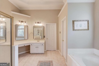 Welcome to this stunning 6 bedroom, 4 bath lakefront home in on Hamilton Mill Golf Club in Georgia - for sale on GolfHomes.com, golf home, golf lot