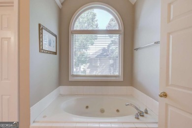 Welcome to this stunning 6 bedroom, 4 bath lakefront home in on Hamilton Mill Golf Club in Georgia - for sale on GolfHomes.com, golf home, golf lot