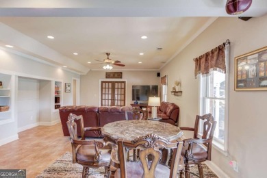 Welcome to this stunning 6 bedroom, 4 bath lakefront home in on Hamilton Mill Golf Club in Georgia - for sale on GolfHomes.com, golf home, golf lot