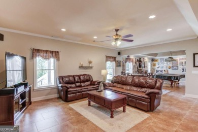 Welcome to this stunning 6 bedroom, 4 bath lakefront home in on Hamilton Mill Golf Club in Georgia - for sale on GolfHomes.com, golf home, golf lot