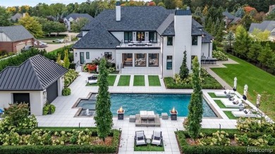 This stunning estate, designed by architect David Lubin and on Meadowbrook Country Club in Michigan - for sale on GolfHomes.com, golf home, golf lot