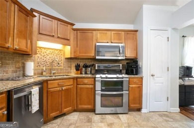 Incredible ranch style home with 4 bedrooms 3 baths situated on on Bridgemill Golf Club in Georgia - for sale on GolfHomes.com, golf home, golf lot