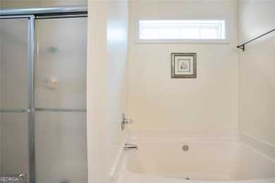 Incredible ranch style home with 4 bedrooms 3 baths situated on on Bridgemill Golf Club in Georgia - for sale on GolfHomes.com, golf home, golf lot