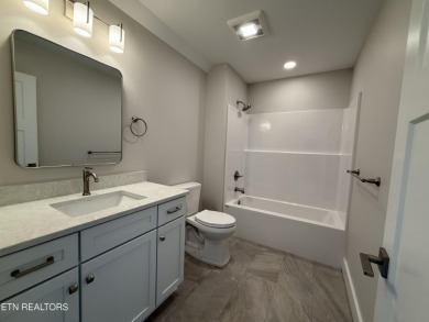 The living is easy in this lovely residence in a gated community on Centennial Golf Course in Tennessee - for sale on GolfHomes.com, golf home, golf lot