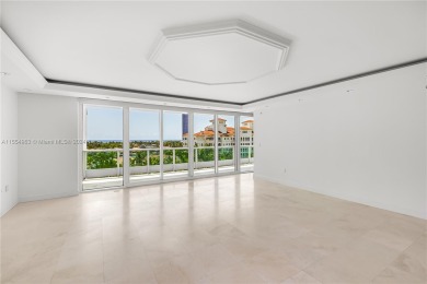 A private entrance foyer leads you into a spacious condo with on Turnberry Isle Resort and Club in Florida - for sale on GolfHomes.com, golf home, golf lot