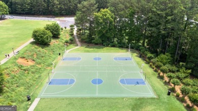 Incredible ranch style home with 4 bedrooms 3 baths situated on on Bridgemill Golf Club in Georgia - for sale on GolfHomes.com, golf home, golf lot