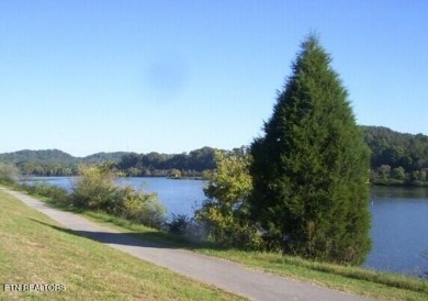 The living is easy in this lovely residence in a gated community on Centennial Golf Course in Tennessee - for sale on GolfHomes.com, golf home, golf lot