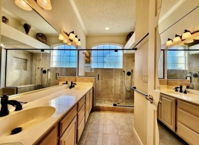 Welcome to your immaculate retreat within the gated and guarded on Hunters Creek Golf Course in Florida - for sale on GolfHomes.com, golf home, golf lot