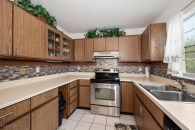 Enjoy LAKEFRONT living with Stunning NW views. Fully Furnished / on Myerlee Country Club in Florida - for sale on GolfHomes.com, golf home, golf lot