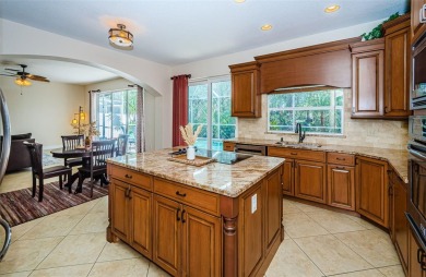 One or more photo(s) has been virtually staged. Nestled within on The Eagles Golf Course and Club in Florida - for sale on GolfHomes.com, golf home, golf lot