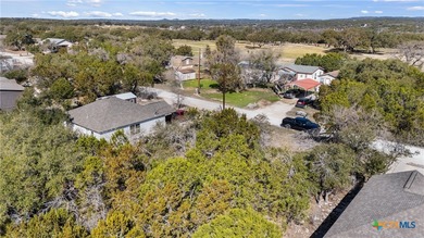 Manufactured housing allowed! Very level lot with fantastic oak on Rebecca Creek Golf Club in Texas - for sale on GolfHomes.com, golf home, golf lot