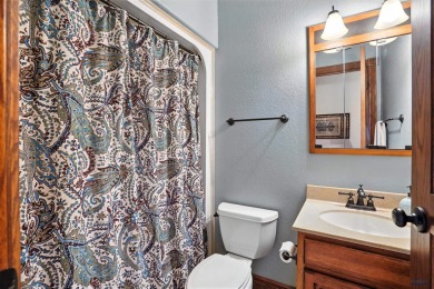 Beautiful custom built, executive home in coveted Enchanted on Arrowhead Country Club in South Dakota - for sale on GolfHomes.com, golf home, golf lot
