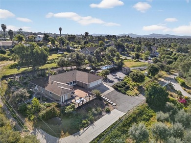 Set on 1.33 acres along a private road in a small community on Pala Mesa Resort in California - for sale on GolfHomes.com, golf home, golf lot